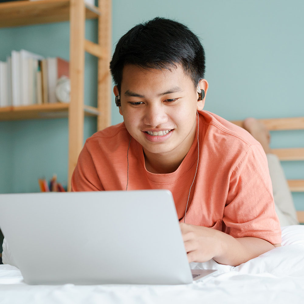 Teenage boy on laptop